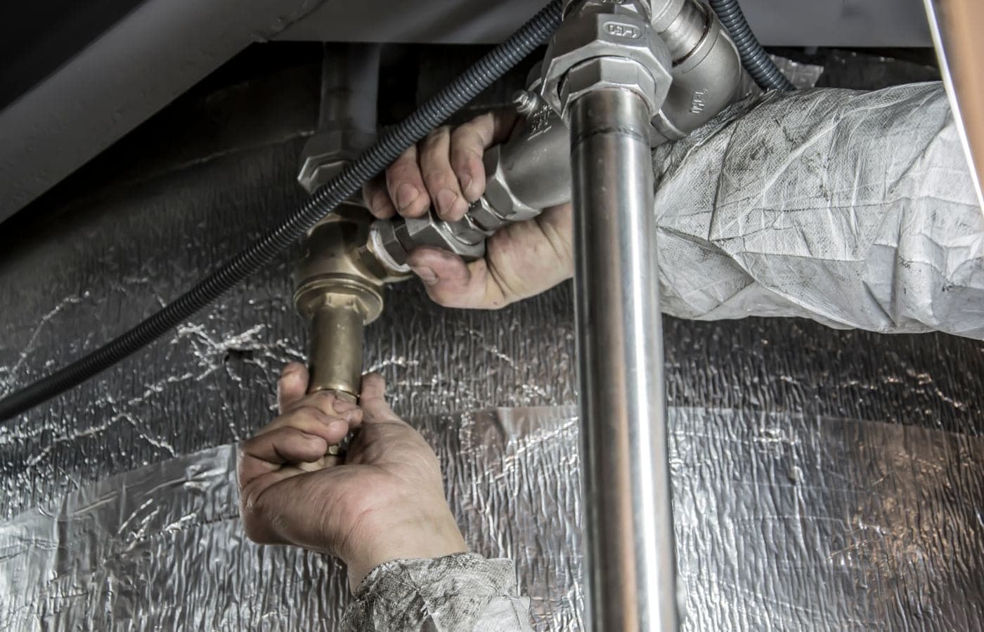 Representative plumbing services photograph; no pictured business is for sale